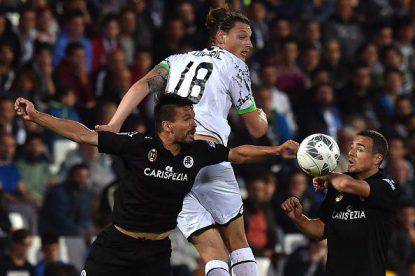 CESENA, ITALY - MAY 24: Jon Errasti (L) and Zoran Kvrzic of Spezia and Milan Djuric of Cesena battle for the ball during the Serie B playoff match between AC Cesena and AC Spezia on May 24, 2016 in Cesena, Italy. (Photo by Tullio M. Puglia/Getty Images)